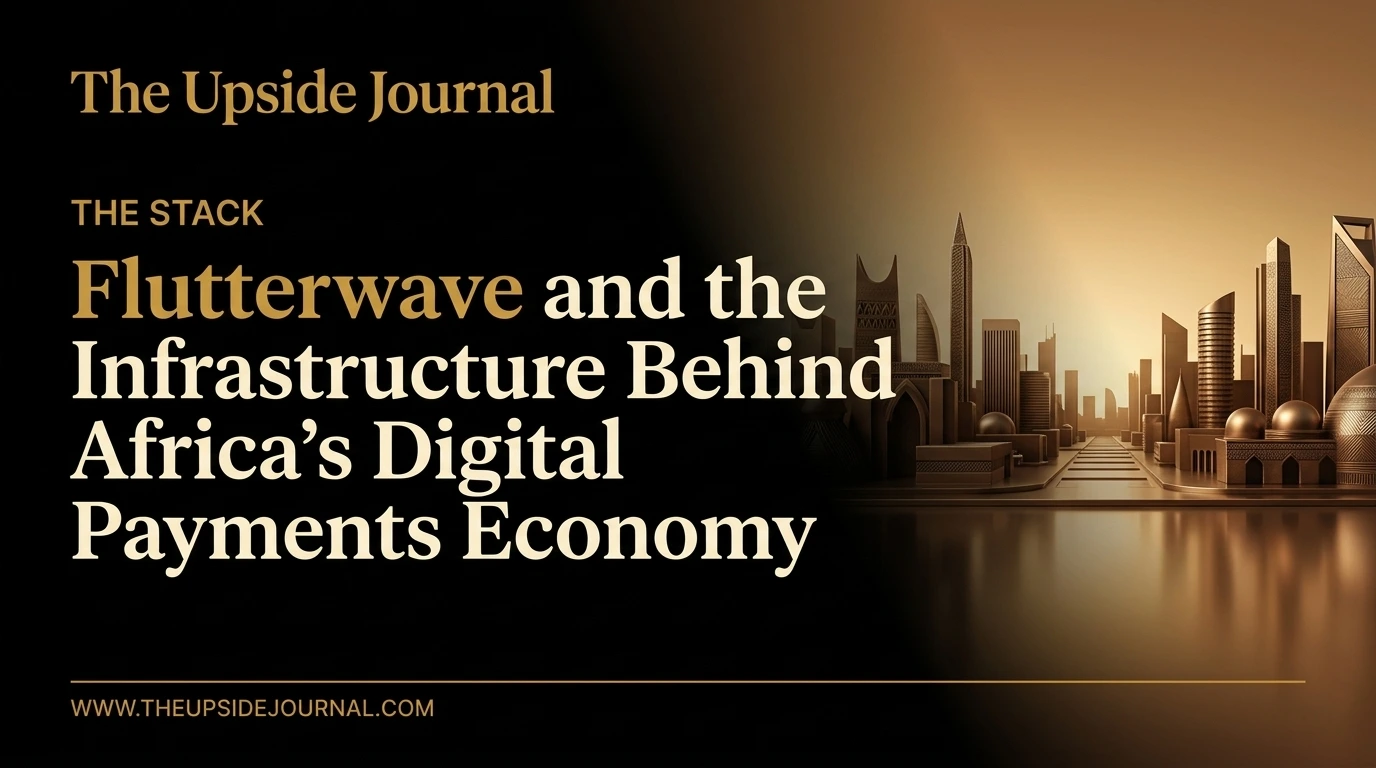 A minimalist editorial illustration of complex, integrated digital pathways and connected nodes in dark bronze and charcoal against a bronze-gold gradient background, symbolizing robust fintech infrastructure. A clean solid black field on the left ensures high legibility for overlaid text, including 'THE STACK' column label and 'www.theupsidejournal.com'.